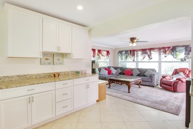 Welcome to this charming 4-bedroom, 2-bathroom home that - photo 4