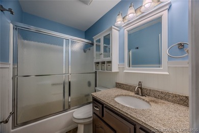 This isn't your typical lake condo-step inside and you'll feel