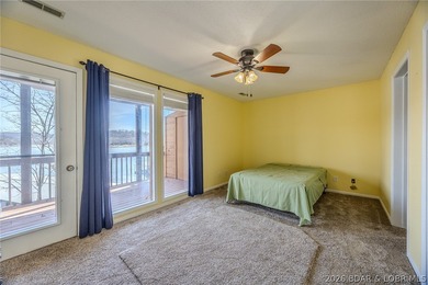 This isn't your typical lake condo-step inside and you'll feel