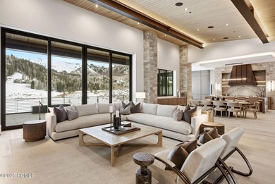 This newly completed estate sits on one of the premier homesites