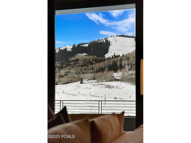 This newly completed estate sits on one of the premier homesites