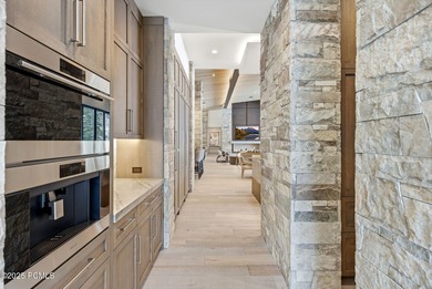 This newly completed estate sits on one of the premier homesites