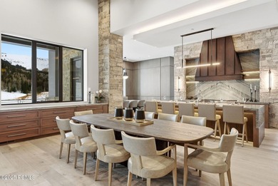 This newly completed estate sits on one of the premier homesites