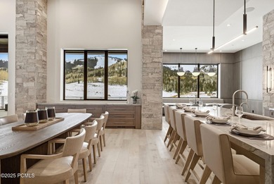 This newly completed estate sits on one of the premier homesites