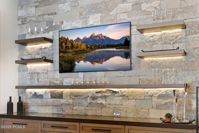 This newly completed estate sits on one of the premier homesites