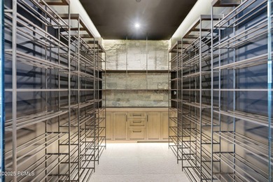 This newly completed estate sits on one of the premier homesites