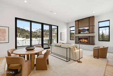 This newly completed estate sits on one of the premier homesites