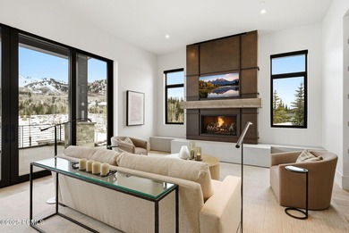 This newly completed estate sits on one of the premier homesites