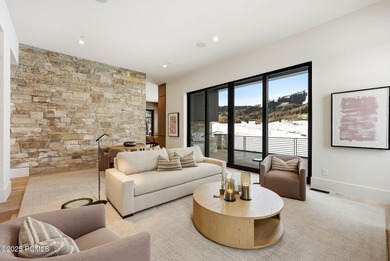 This newly completed estate sits on one of the premier homesites