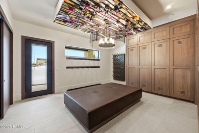 This newly completed estate sits on one of the premier homesites