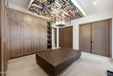 This newly completed estate sits on one of the premier homesites