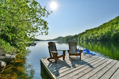 (private lake, pond, creek) Home For Sale in Sainte-Marguerite-du-Lac-Masson Quebec