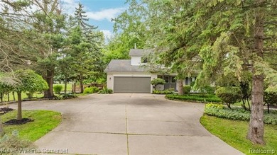 Nestled on nearly 2 acres of beautifully maintained property - photo 2