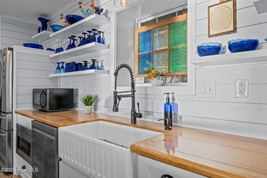 Welcome to an exceptional Neuse River retreat, just across the - photo 9