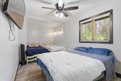 Tucked among towering trees on 2.5 wooded acres at the end of a - photo 11