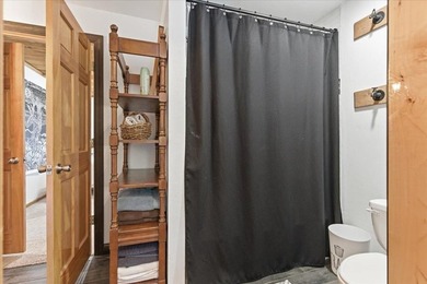 Tucked among towering trees on 2.5 wooded acres at the end of a - photo 17