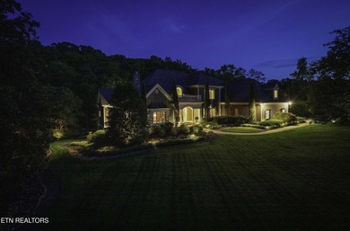 Tucked away in the serene enclave of Riverbend, this stately - photo 1