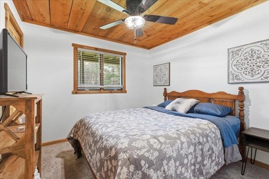 Tucked among towering trees on 2.5 wooded acres at the end of a - photo 23