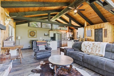 Tucked among towering trees on 2.5 wooded acres at the end of a - photo 33