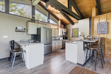 Tucked among towering trees on 2.5 wooded acres at the end of a - photo 34