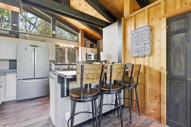 Tucked among towering trees on 2.5 wooded acres at the end of a - photo 35