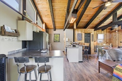 Tucked among towering trees on 2.5 wooded acres at the end of a - photo 37