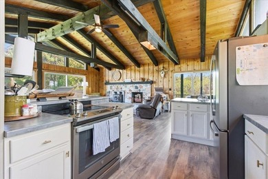 Tucked among towering trees on 2.5 wooded acres at the end of a - photo 40