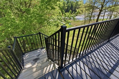Tucked among towering trees on 2.5 wooded acres at the end of a - photo 50