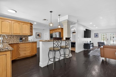 Tucked on an oversized double lot minutes from the beach, this 4 - photo 12