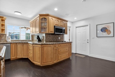 Tucked on an oversized double lot minutes from the beach, this 4 - photo 13