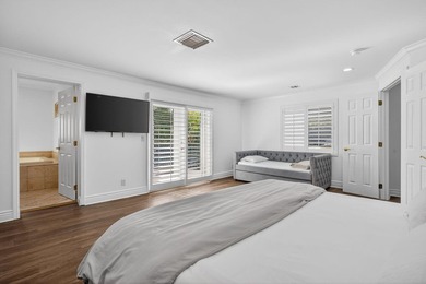 Tucked on an oversized double lot minutes from the beach, this 4 - photo 18