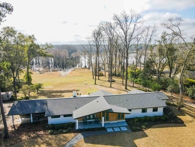 Quiet lakefront living with style: This midcentury modern ranch - photo 20