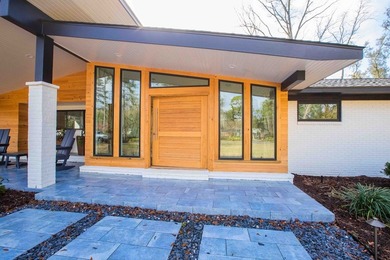 Quiet lakefront living with style: This midcentury modern ranch - photo 22