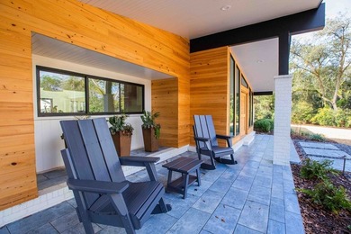 Quiet lakefront living with style: This midcentury modern ranch - photo 23