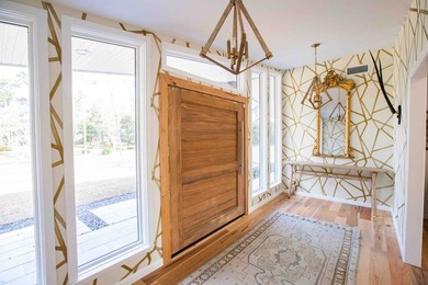 Quiet lakefront living with style: This midcentury modern ranch - photo 24