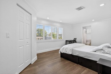 Tucked on an oversized double lot minutes from the beach, this 4 - photo 25