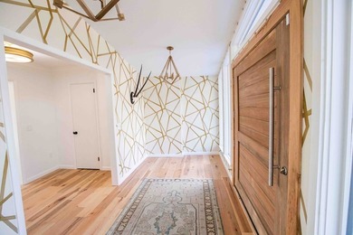 Quiet lakefront living with style: This midcentury modern ranch - photo 26