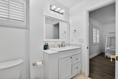 Tucked on an oversized double lot minutes from the beach, this 4 - photo 27