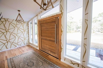Quiet lakefront living with style: This midcentury modern ranch - photo 27