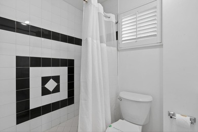 Tucked on an oversized double lot minutes from the beach, this 4 - photo 28