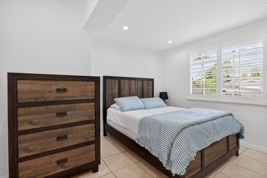 Tucked on an oversized double lot minutes from the beach, this 4 - photo 33