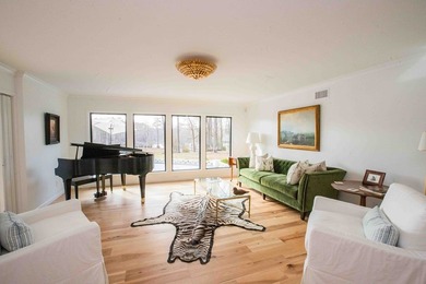 Quiet lakefront living with style: This midcentury modern ranch - photo 33
