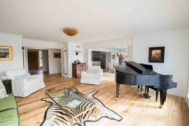 Quiet lakefront living with style: This midcentury modern ranch - photo 34