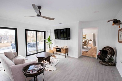 Quiet lakefront living with style: This midcentury modern ranch - photo 36