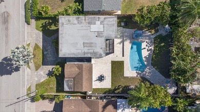 Tucked on an oversized double lot minutes from the beach, this 4 - photo 39