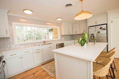 Quiet lakefront living with style: This midcentury modern ranch - photo 39