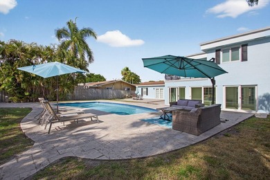 Tucked on an oversized double lot minutes from the beach, this 4 - photo 44