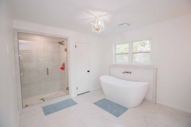 Quiet lakefront living with style: This midcentury modern ranch - photo 51