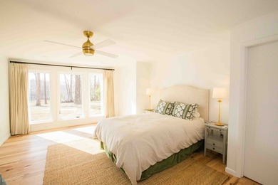 Quiet lakefront living with style: This midcentury modern ranch - photo 56