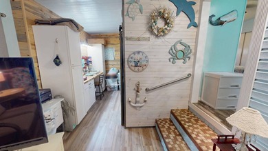 This single-story home is in Reflections On Silver Lake (55+ - photo 9